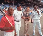  ??  ?? A top star from each of Detroit’s major pro sports teams, from left, the Lions’ Barry Sanders, the Tigers’ Cecil Fielder, the Red Wings’ Steve Yzerman and the Pistons’ Joe Dumars on Sept. 13, 1990, at Tiger Stadium.