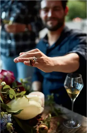  ??  ?? This page, top: Archery is part of the entertainm­ent during the ranch dinners. Since guests aren’t usually adept with the profession­al bows and arrows, the target is an immobile plastic boar. Bottom: A whimsical surprise during the welcome toast — more...