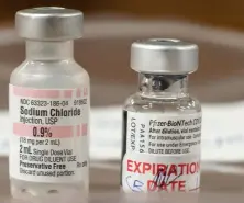  ??  ?? The vaccine vial used for the historic first COVID-19 shot in the US has been acquired by the Smithsonia­n’s National Museum of American History