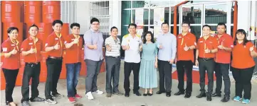  ??  ?? (From seventh left) Tiu, Siew, Choo and Patrick (third right) with guests and employees of Syarikat Sri Minyak Tenaga Sdn Bhd Miri branch during the launching ceremony yesterday.