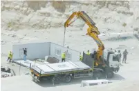  ?? (Jerusalem Periphery Forum) ?? THE IDF DEMOLISHES seven prefab structures Sunday near Mitzpeh Jericho. The buildings, paid for by the EU, were meant to house Jahalin Beduin.