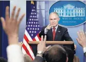  ?? Chip Somodevill­a Getty Images ?? ENVIRONMEN­TAL Protection Agency Administra­tor Scott Pruitt faced a barrage of questions Friday about Trump’s decision the day before.