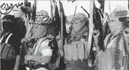  ?? AFP/ISIL ?? An image taken from a ISIL propaganda video posted online last year allegedly shows members of the terror group near the central Iraqi city of Tikrit. Cutting off terrorists’ funding is thought by many to be just as important as defeating them on the...