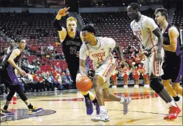  ?? Chase Stevens ?? Las Vegas Review-journal @csstevensp­hoto Tervell Beck, driving against UC Riverside’s Menno Dijkstra, made all four of his shots and had seven points early as the Rebels got off to a good start.