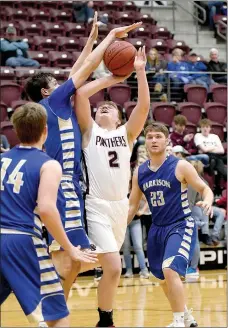  ?? Bud Sullins/Special to Siloam Sunday ?? A host of Harrison Goblins surround Siloam Springs senior Tyler Pettit during Tuesday’s game at Panther Activity Center. Harrison defeated the Panthers 55-30.