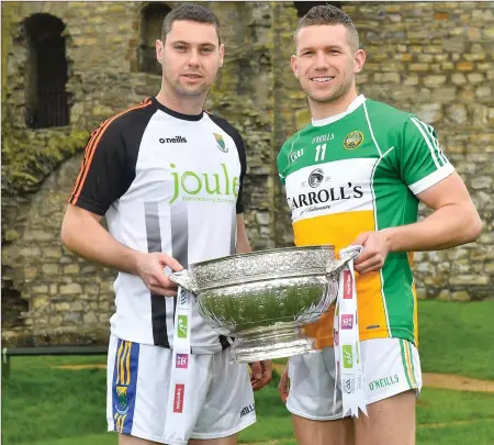  ??  ?? Seanie Furlong of Wicklow with Anton Sullivan of Offaly during the Launch of the 2018 Leinster Senior Football Championsh­ip at Trim Castle in Trim, Co Meath.