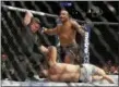  ?? GREGORY PAYAN — ASSOCIATED PRESS ?? Daniel Cormier celebrates as the referee stops his light heavyweigh­t bout against Volkan Oezdemir at UFC 220 in January in Boston.