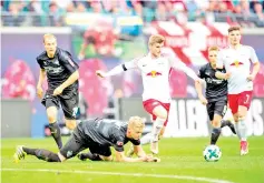  ?? — AFP photo ?? Leipzig’s German forward Timo Werner (R) and Stuttgart’s German defender Timo Baumgartl vie for the ball during the German first division Bundesliga football match between RB Leipzig and VfB Stuttgart in Leipzig, eastern Germany, on October 21, 2017.