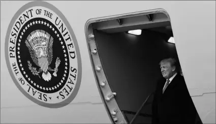  ?? AP PHOTO/SUSAN WALSH ?? In this April 15 file photo, President Donald Trump walks down the steps of Air Force One at Andrews Air Force Base in Md.