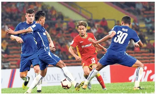  ??  ?? Talented: Faiz Nasir (in red) is known for his trickery and speed. He is one of the five uncapped players called up by Malaysia head coach Tan Cheng Hoe.