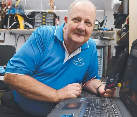  ?? Picture: PETER RISTEVSKI ?? TLC FOR PCs: South Barwon Computers’ John Adams enjoys looking after his customers.