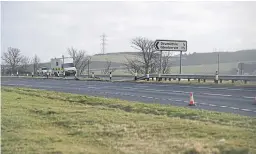  ??  ?? Top: The doubledeck­er bus involved in the collision. Above: The A90 at Drumlithie, the location of the crash.