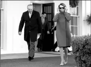 ?? ANDREW HARNIK / ASSOCIATED PRESS ?? Nancy Pelosi, D-Calif., and Senate Minority Leader Chuck Schumer, D-N.Y., walk out of the West Wing of the White House on Dec. 11 after a meeting with President Donald Trump.