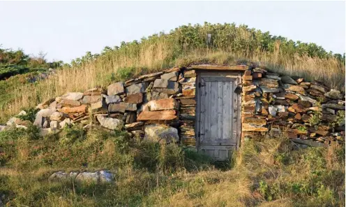  ??  ?? Root cellars abound at Elliston, N.L., the self-styled Root Cellar Capital of the World. Caption