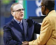  ?? OTTO GREULE JR / GETTY IMAGES ?? Seahawks owner Paul Allen, who died Oct. 15, greets NFL Hall of Fame member and former Seahawks star Kenny Easley earlier this month. Allen also owned the NBA’s Portland Trail Blazers.
