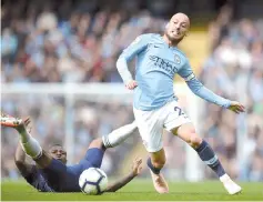  ??  ?? Manchester City’s David Silva vies with Fulham’s Jean Michael Seri in their English Premier League match in Manchester in this Sept 15 file photo. — AFP photo
