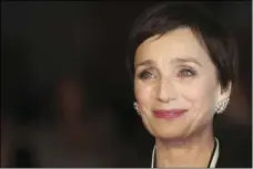  ?? AP PHOTO/VIANNEY LE CAER/INVISION ?? Actress Kristin Scott Thomas poses for photograph­ers upon arrival at the BAFTA Awards 2018 in London, Sunday.