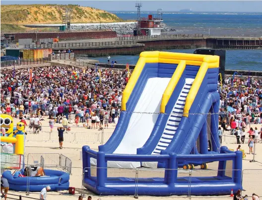  ??  ?? Tragedy at the seaside: The trampoline and slide at Gorleston beach in Norfolk last week, before the accident happened