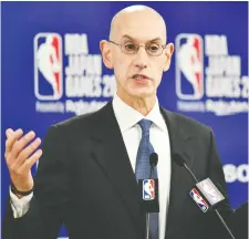  ?? KAZUHIRO NOGI/AFP VIA GETTY IMAGES FILES ?? Regarding speculatio­n on when the NBA might return to action, commission­er Adam Silver quotes Disney chairman Bob Iger: “It’s about the data, not the date.”