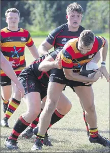  ?? Picture: Chris Davey FM17196729 ?? Ashford attempt to wriggle clear against Park House on Saturday