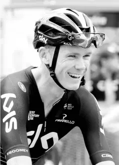  ??  ?? Three-time Tour de France winner Britain’s Chris Froome of Team Sky smiles as he takes part in stage four of the 2017 Herald Sun Tour cycling race in Melbourne on February 5, 2017. - AFP photo