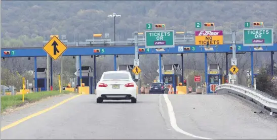  ?? MEDIANEWS GROUP FILE PHOT0 ?? The temporary switch to a cashless system the Pennsylvan­ia Turnpike says was implemente­d to save money as revenues plunged with the coronaviru­s pandemic will be permanent. So, 500 workers, mainly toll takers, will be laid off with the assessment that the downturn in travel will continue, officials say.