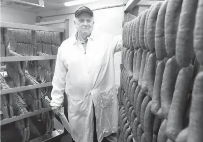  ?? KENNETH K. LAM/BALTIMORE SUN ?? Alvin Manger, 81, is the fourth-generation owner of Manger Packing Corp., which has made the half-smoke sausages for Ben’s Chili Bowl in Washington, D.C., for 25 years.