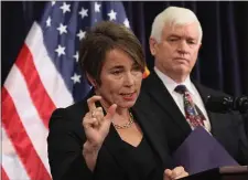  ?? NANCY LANE — BOSTON HERALD, FILE ?? Gov. Maura Healey, with Lt. General Scott Rice, gives an update on the emergency family shelter program.