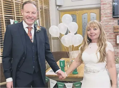  ?? ?? Ingrid Middleton and Rob Farnham used their wedding to raise funds for Macmillan Cancer Support.