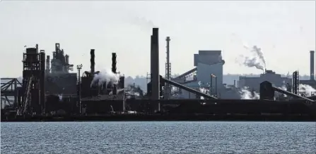  ?? FRANK GUNN THE CANADIAN PRESS ?? Part of a steel mill in Hamilton. Metal producers in Canada are bracing for the fallout of stiff new tariffs proposed by U.S. President Donald Trump.