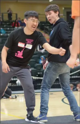  ?? ?? WINNER— Teague GreenJohns­on, right, won gold in the Indian Stick Pull.