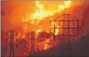  ?? Mike Eliason Associated Press ?? THE PROPOSED California Wildfire Insurance Fund would collect money from utility companies.