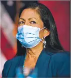  ?? CAROLYN KASTER/AP FILE PHOTO ?? LOWER LEFT: U.S. Rep. Deb Haaland, an Albuquerqu­e Democrat, listens Dec. 19 as President-elect Joe Biden announces her as his nominee for interior secretary in Wilmington, Del.