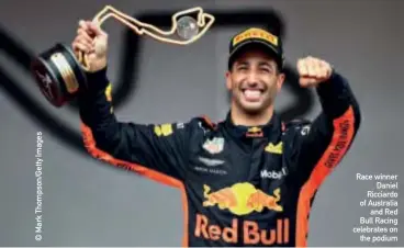  ??  ?? Race winner Daniel Ricciardo of Australia and Red Bull Racing celebrates on the podium