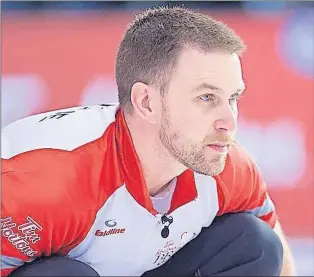  ?? CP PHOTO ?? Brad Gushue, shown here at the 2016 Tim Hortons Brier in Ottawa, wonders how teams can play in the “gutwrenchi­ng” pre-qualifying round.