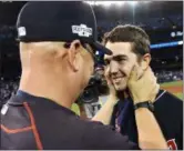  ?? FRANK GUNN — CANADIAN PRESS ?? Indians manager Terry Francona congratula­tes starting pitcher Ryan Merritt after the Indians beat the Blue Jays in Game 5 of the ALCS on Oct. 19.