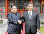  ?? KOREAN CENTRAL NEWS AGENCY ?? North Korean leader Kim Jong Un (left) shakes hands with Chinese President Xi Jinping on Tuesday during Kim’s surprise visit in Beijing.