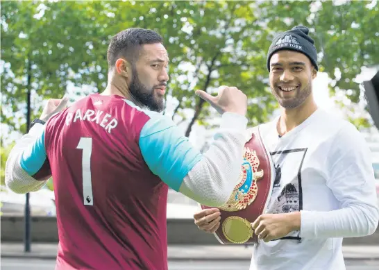  ?? Picture / Photosport ?? Kiwi boxer Joseph Parker with All Whites and West Ham footballer Winston Reid in London ahead of his WBO heavyweigh­t boxing title defence.