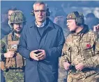  ?? ?? Backed...Ben Wallace and Jens Stoltenber­g meet Ukraine troops in UK yesterday