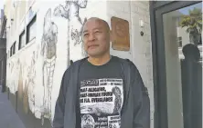  ?? Liz Hafalia / The Chronicle ?? Producer/artist Dan “the Automator” Nakamura on Mission Street. After years in rap and indie music, he’s scoring movies.