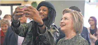  ?? JOE RAEDLE, GETTY IMAGES ?? Hillary Clinton greets people during a campaign stop in Indianapol­is.