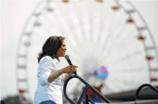  ?? (AP PHOTO/JOHN LOCHER) ?? Democratic presidenti­al candidate Sen. Kamala Harris, D-Calif., speaks at the Iowa State Fair on Saturday in Des Moines, Iowa.