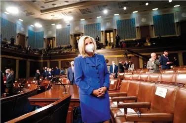  ?? The Associated Press ?? n Rep. Liz Cheney, R-Wyo., arrives to the chamber ahead of President Joe Biden speaking to a joint session of Congress on April 28 in the House Chamber at the U.S. Capitol in Washington.