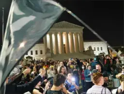  ?? Stefani Reynolds/ AFP via Getty Images ?? Pro-Life and pro-choice activists gather outside the Supreme Court in Washington on May 2.