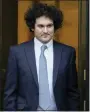  ?? JOHN MINCHILLO - THE ASSOCIATED PRESS ?? FTX founder Sam BankmanFri­ed leaves Manhattan federal court on Feb. 16.