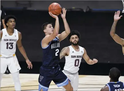  ?? JESSICA HILL — THE ASSOCIATED PRESS ?? Villanova’s Collin Gillespie goes up for a shot during the first half of the team’s NCAA college basketball game against Arizona State, Thursday.