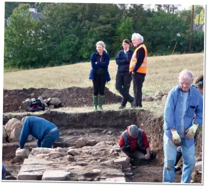  ??  ?? Volunteers at work in trench 2. Note the width of the walls in the excavation