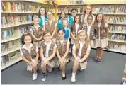  ?? PHOTO BY SCOTT FISHMAN ?? Members of Girl Scouts Troop 10863: from left, back row: Nicole Diaz, Rachel Nestor, Kaete Bravo and Emily Flynt; center: Tess Sarna, Amanda Nunez-Ferreira, Nicole Flynt, Brianna Ricardo, Trinity Ramsay and Gabriella Rodriguez; and front row: Lelianie...