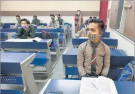  ?? SANJEEV VERMA/HT PHOTO ?? Students attend a class at Kautilya Govt. Sarvodaya Bal Vidyalaya in January. Schools in Delhi had reopened briefly for Class 10 and 12 students with several restrictio­ns.