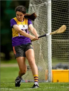  ??  ?? Aoibhinn Mernagh on her way to Under-14 long puck glory.